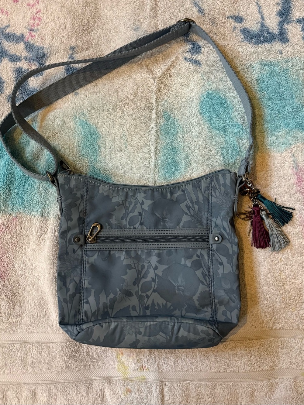 SAKROOTS Sequoia Small Crossbody Bag Tonal Floral Pattern With Bag Charm